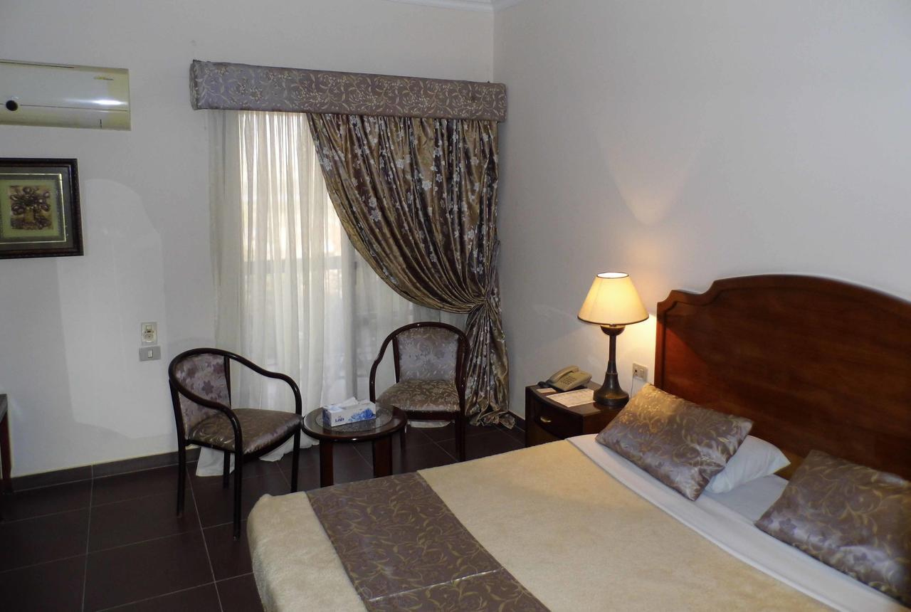 Mg Nefertiti Hotel Menia Habitación foto